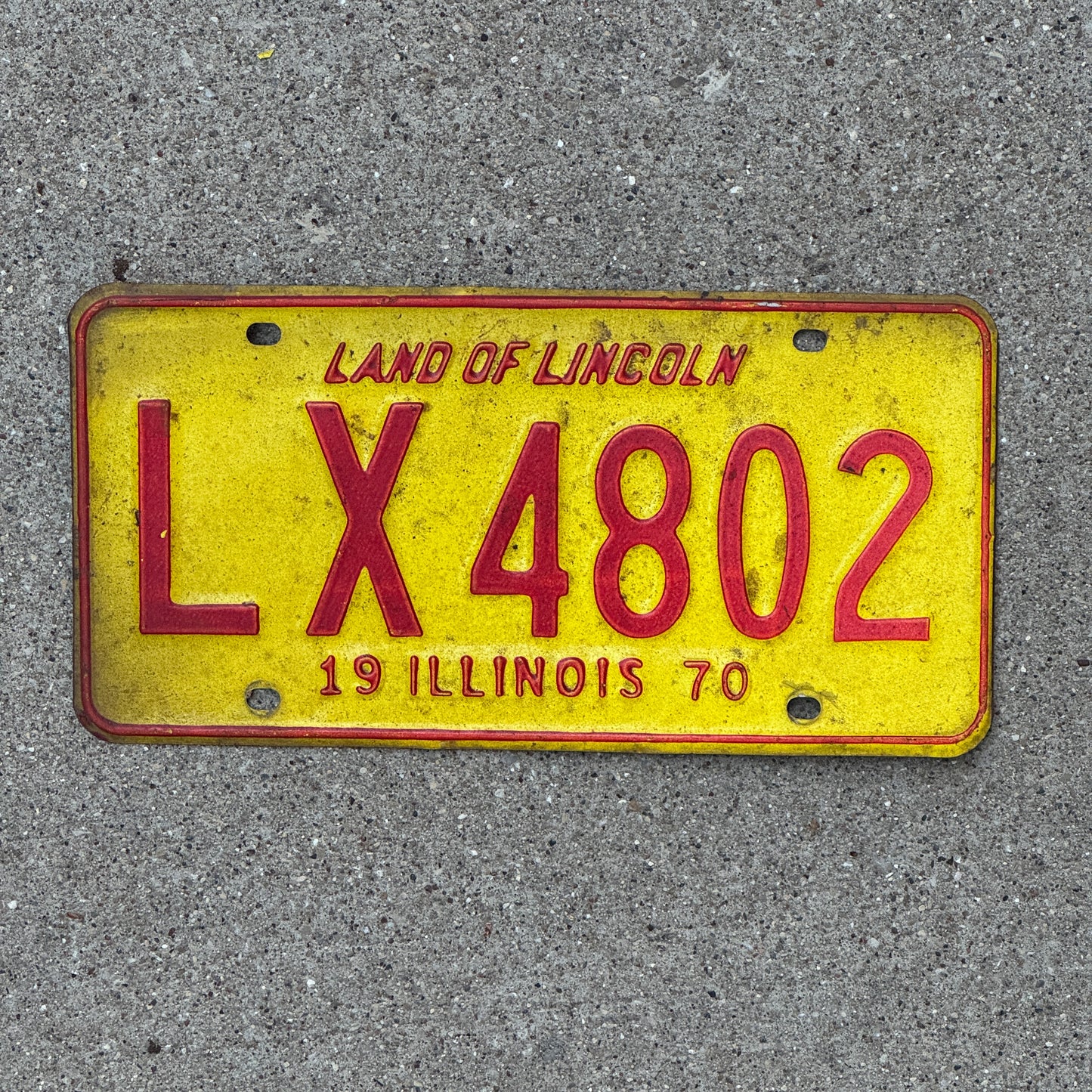 Photo of a 1970 Illinois License Plate Auto Tag 1 Vintage Garage LX 4802 with original patina