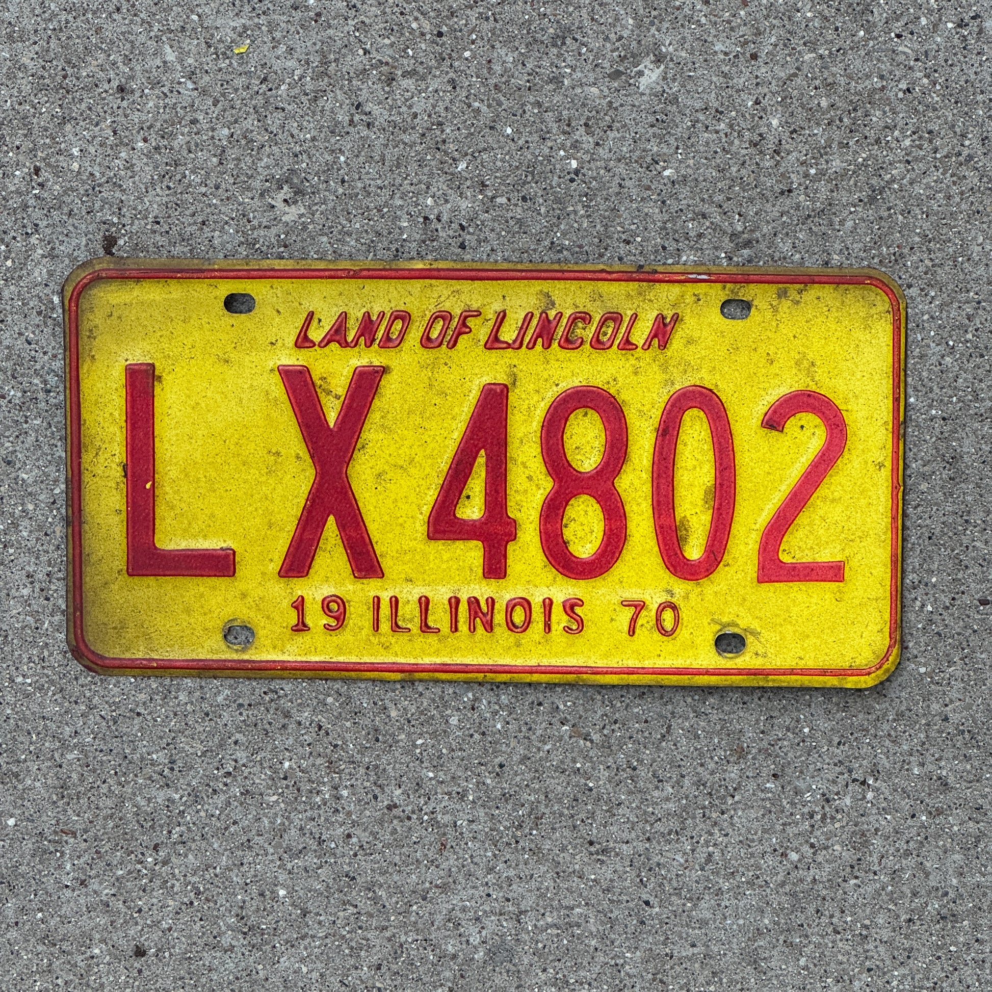 Photo of a 1970 Illinois License Plate Auto Tag 1 Vintage Garage LX 4802 with original patina