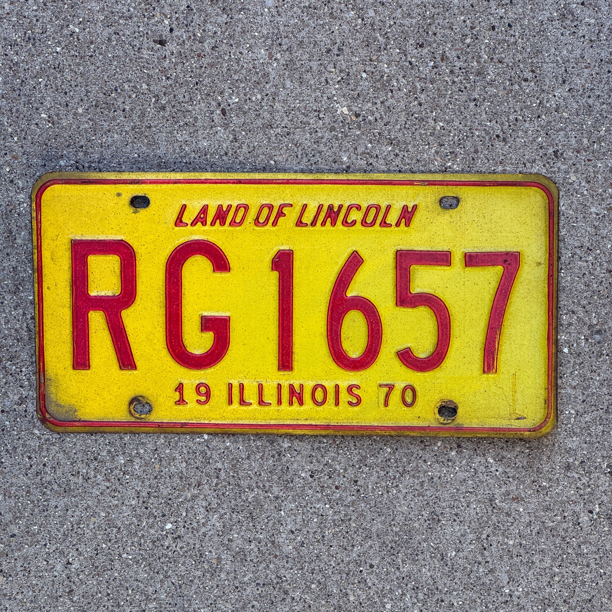 Photo of a 1970 Illinois License Plate Auto Tag 1 Vintage Garage RG 1657 with original patina