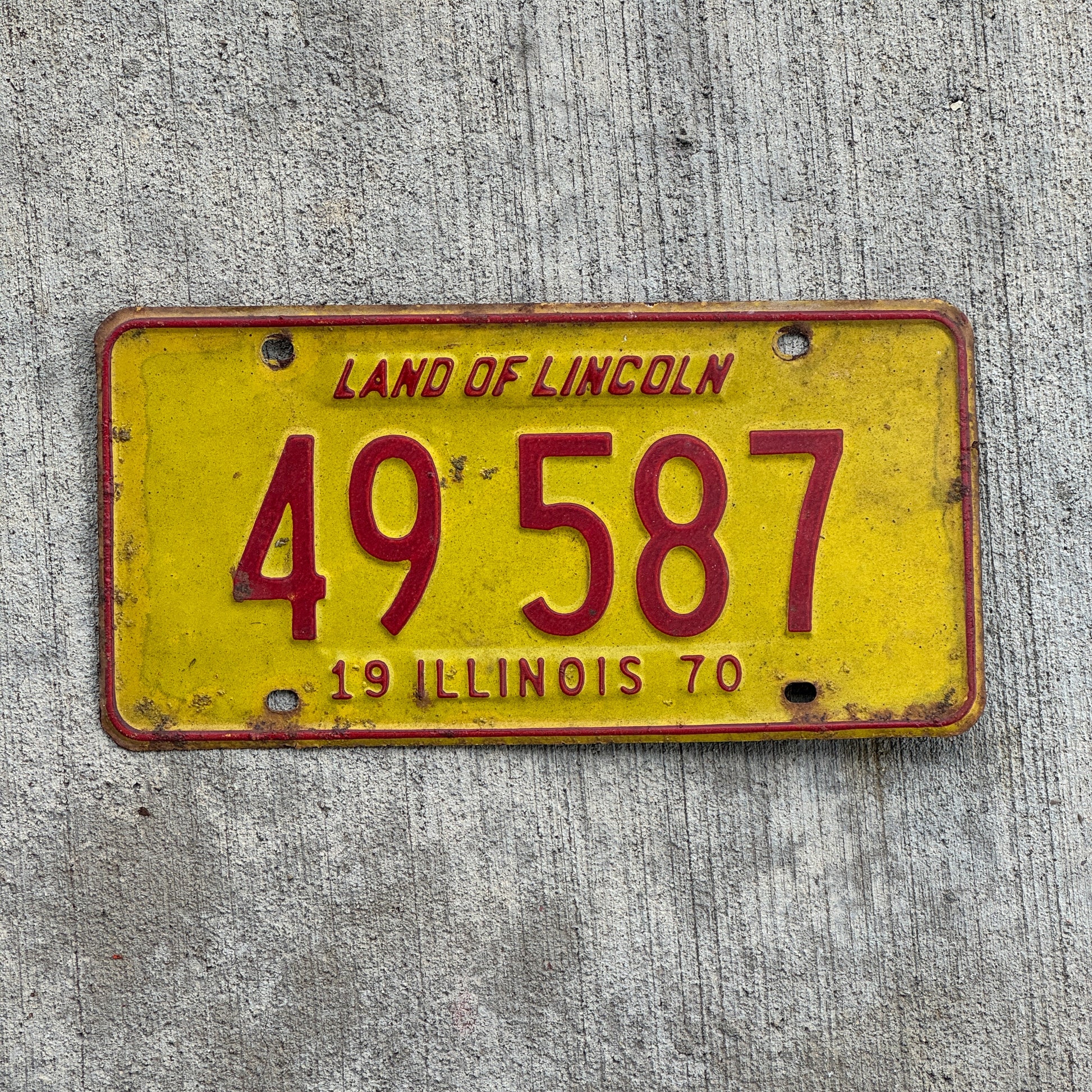Photo of a 1970 Illinois License Plate Auto Tag 2 Vintage Garage 49 587 with original patina