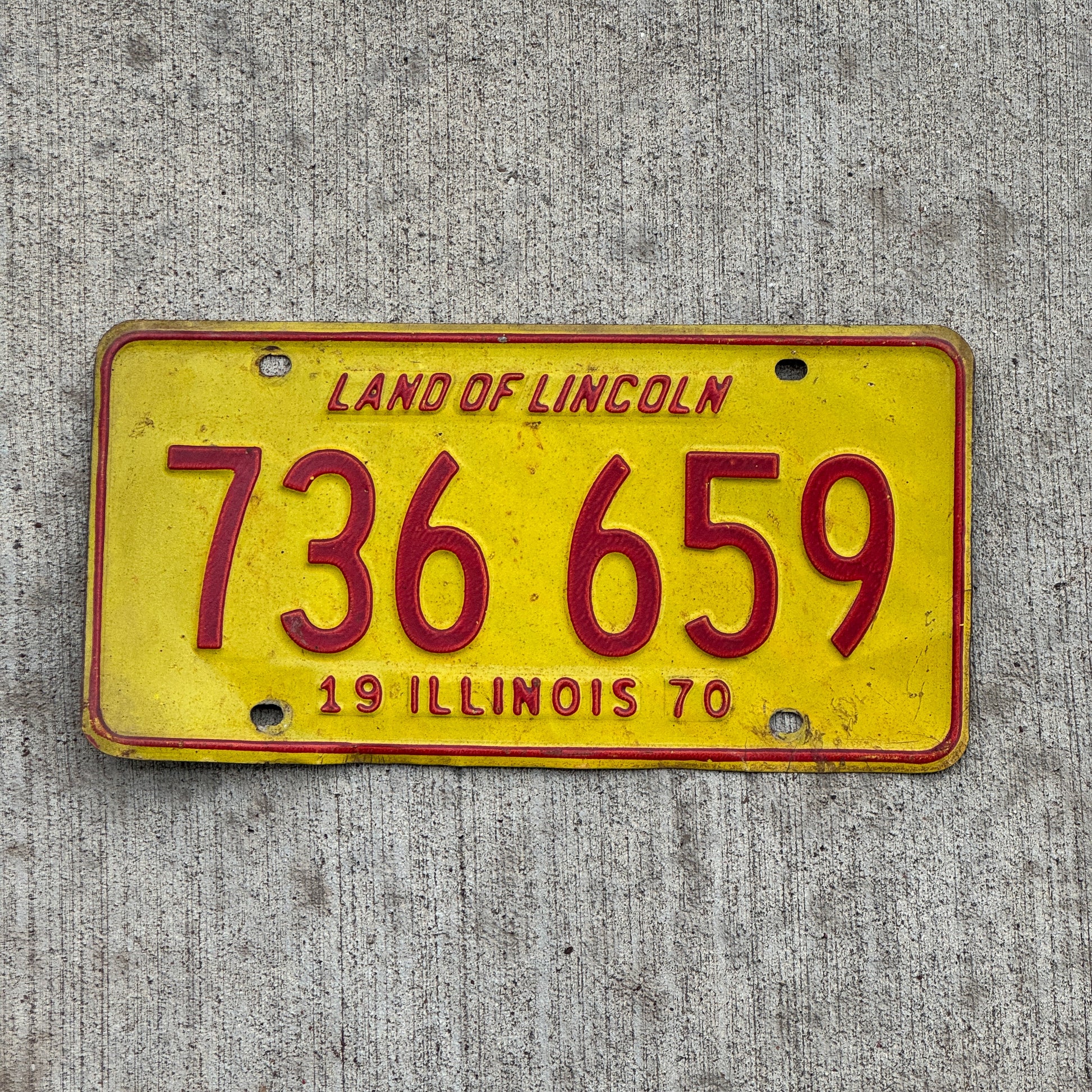 Photo of a 1970 Illinois License Plate Auto Tag 2 Vintage Garage 736 659 with original patina