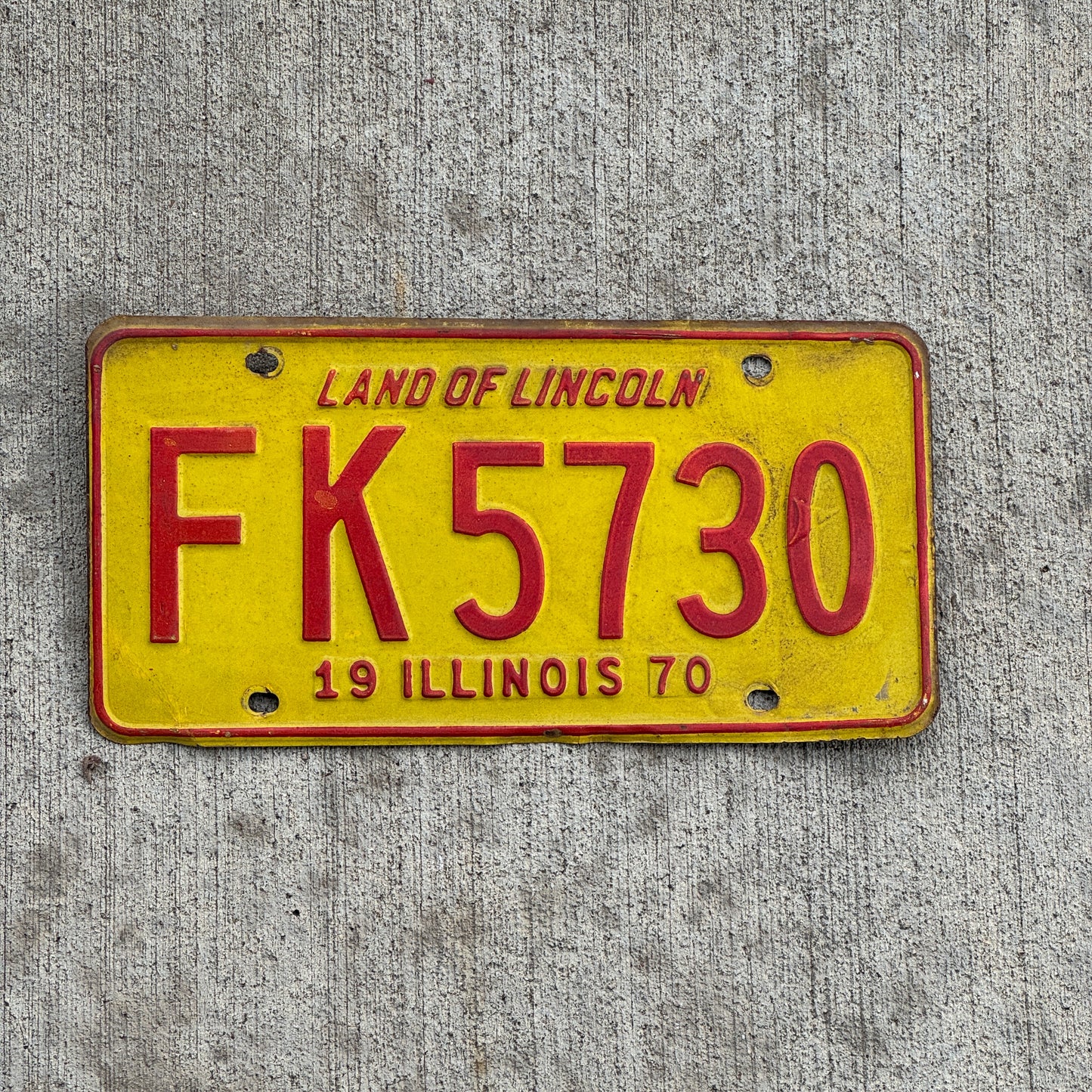Photo of a 1970 Illinois License Plate Auto Tag 2 Vintage Garage FK 5730 with original patina