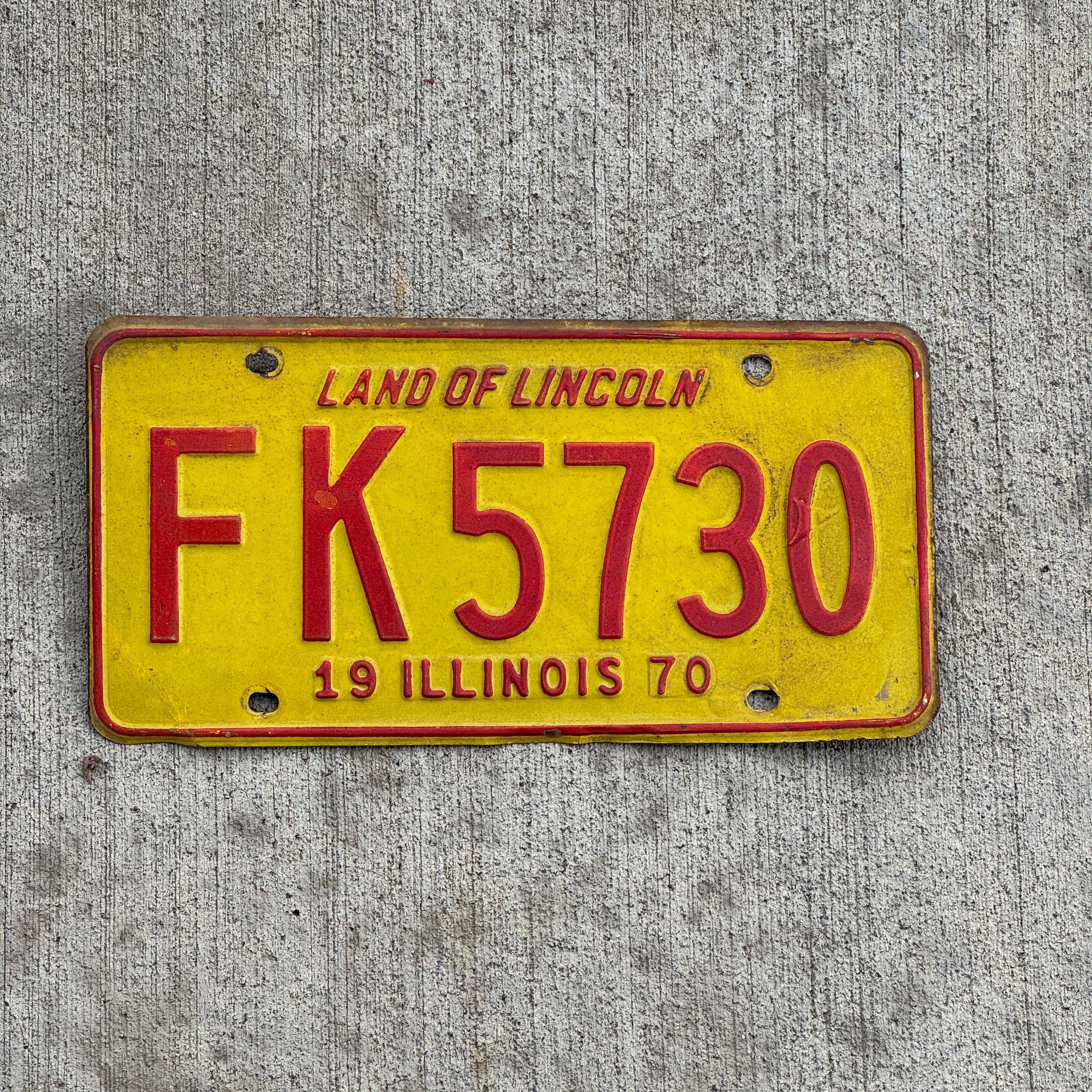 Photo of a 1970 Illinois License Plate Auto Tag 2 Vintage Garage FK 5730 with original patina