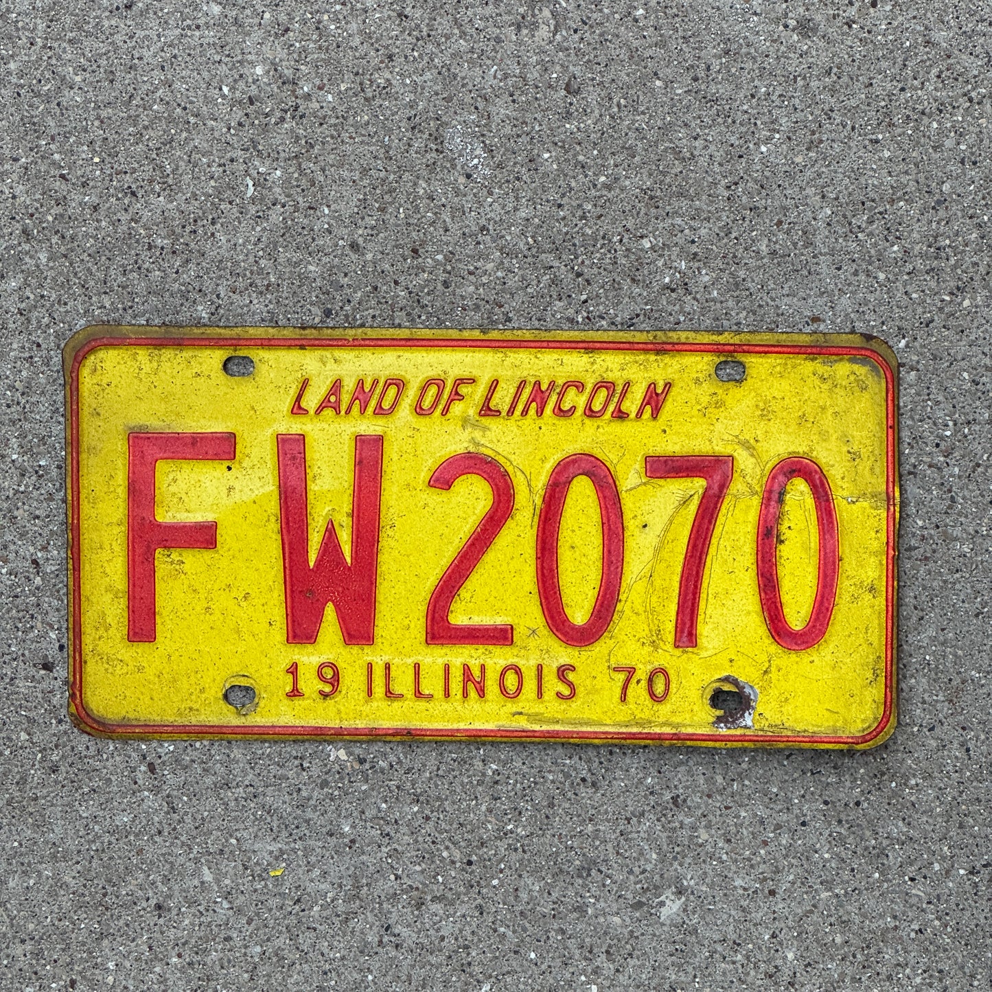 Photo of a 1970 Illinois License Plate Auto Tag 2 Vintage Garage FW 2070 with original patina