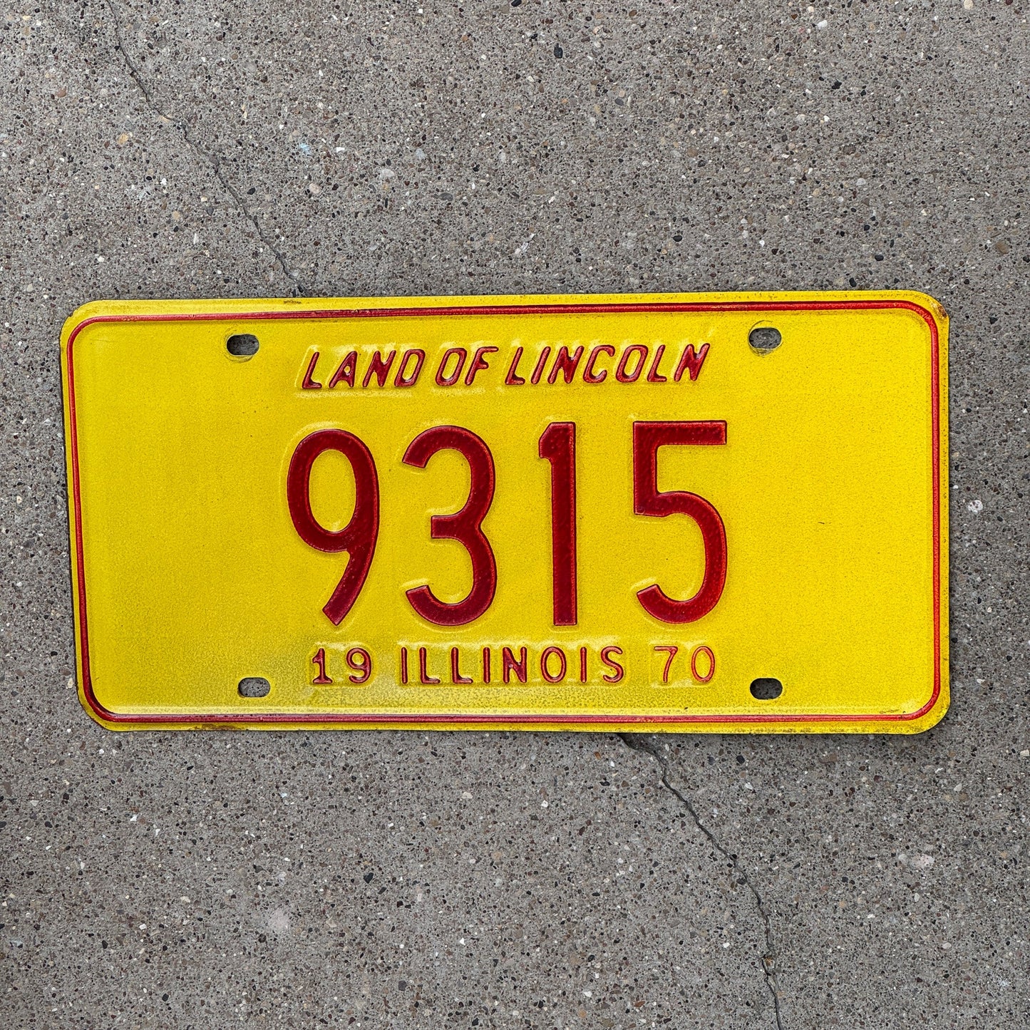 Photo of a 1970 Illinois License Plate Auto Tag Garage Decor Vintage Low Number Four Digit 9315 with original patina