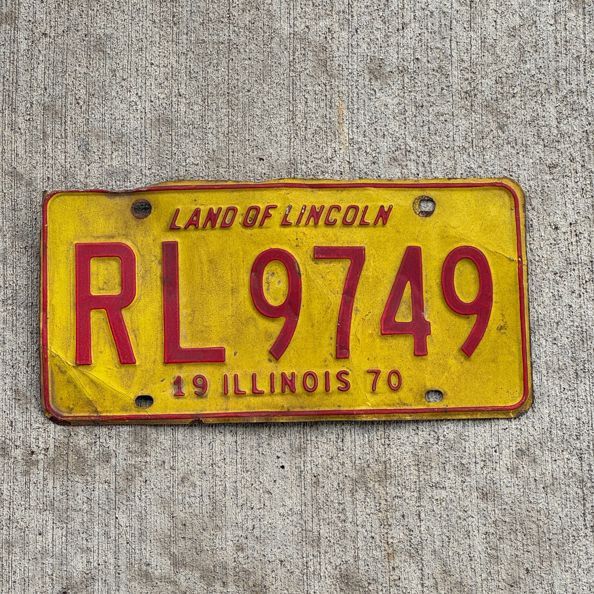 Photo of a 1970 Illinois License Plate Auto Tag Garage Decor Vintage RL 9749 with original patina