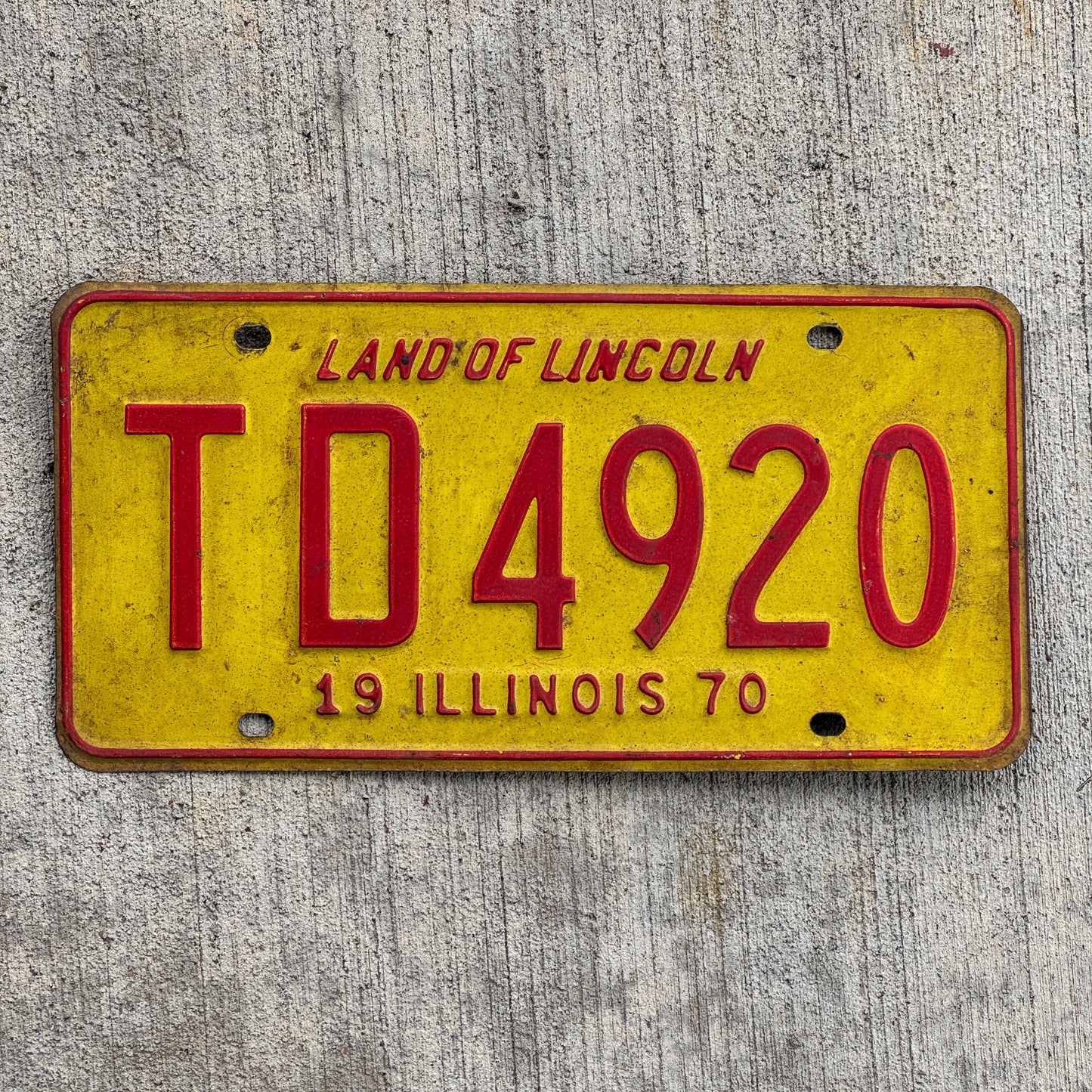 Photo of a 1970 Illinois License Plate Auto Tag Garage Decor Vintage TD 4920 with original patina