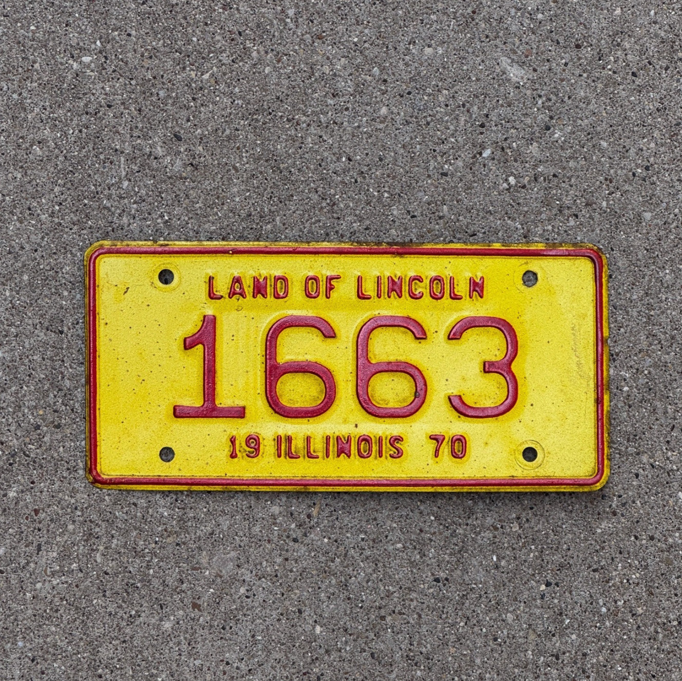 Photo of a 1970 Illinois Motorcycle License Plate Auto Tag Garage Decor Vintage 1663 with original patina