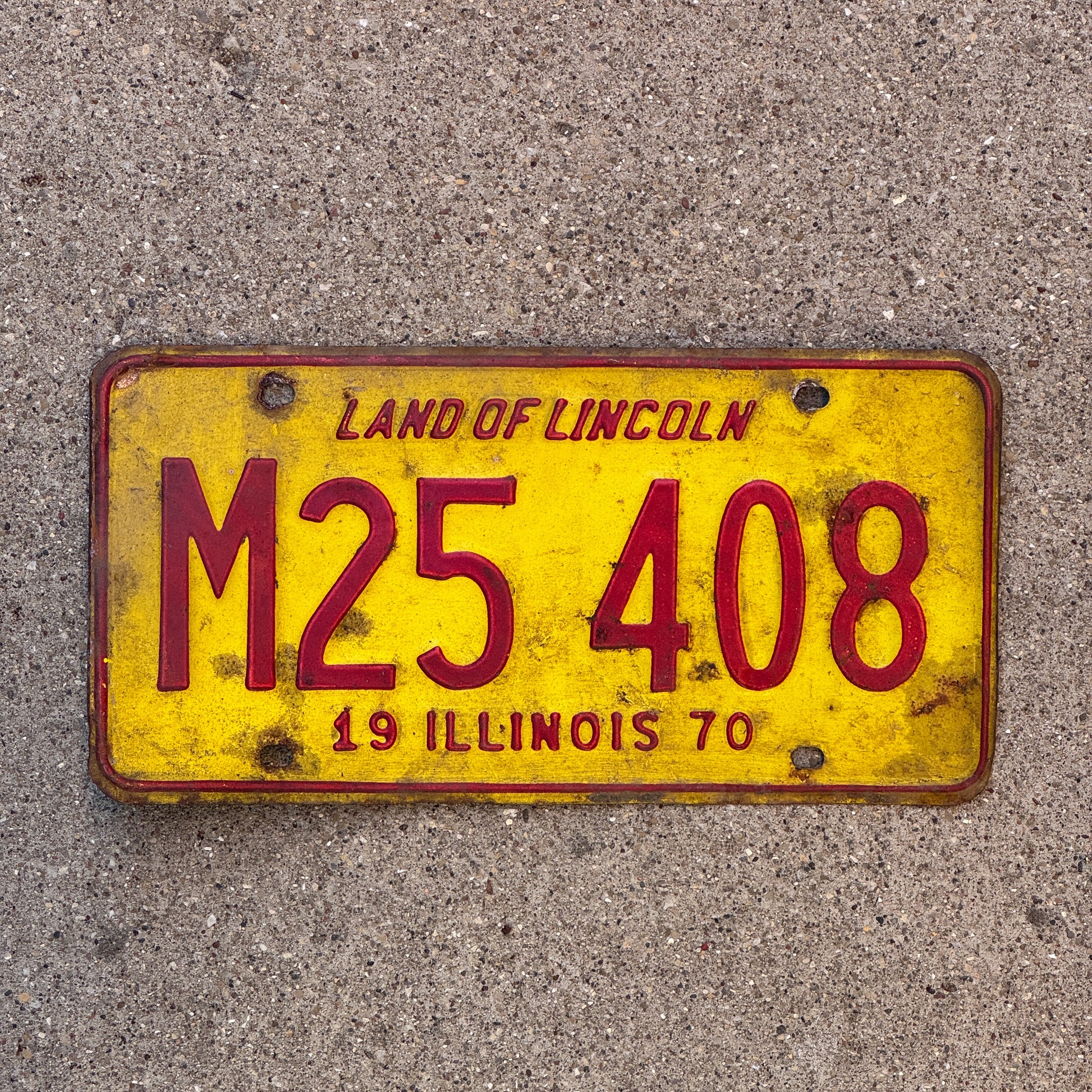 Photo of a 1970 Illinois Municipal License Plate Auto Tag 1 Vintage Garage M 25 408 with original patina