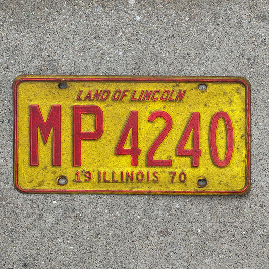Photo of a 1970 Illinois Truck Mileage Tax License Plate Auto Tag 1 Vintage Garage MP 4240 with original patina