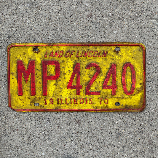 Photo of a 1970 Illinois Truck Mileage Tax License Plate Auto Tag 2 Vintage Garage MP 4240 with original patina
