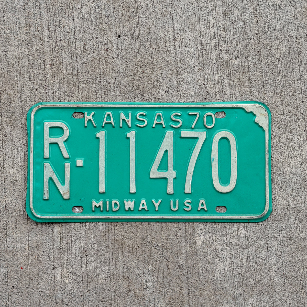 Photo of a 1970 Kansas License Plate Auto Tag Garage Decor Vintage RN 11470 with original patina