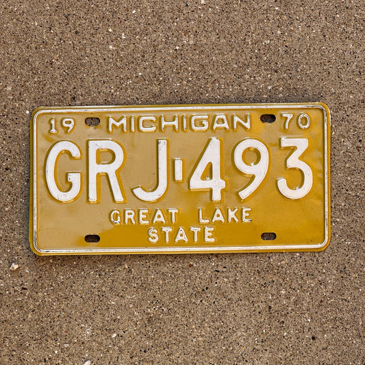 Photo of a 1970 Michigan License Plate Auto Tag 1 Garage Decor GRJ 493