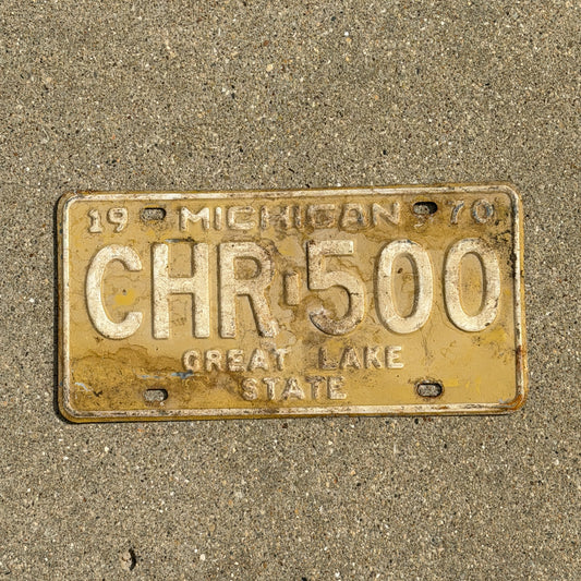 Photo of a 1970 Michigan License Plate Auto Tag Garage Decor Vintage CHR 500 with original patina