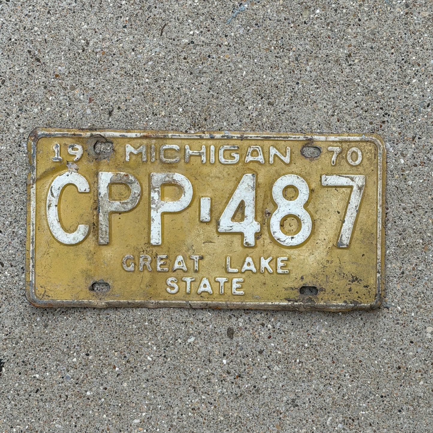 Photo of a 1970 Michigan License Plate Auto Tag Garage Decor Vintage CPP 487 with original patina