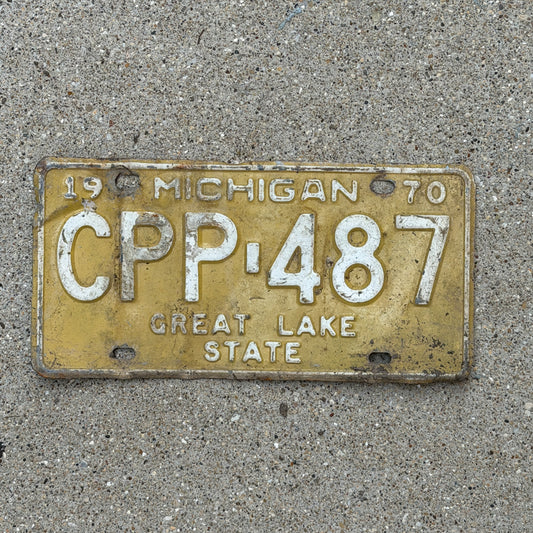 Photo of a 1970 Michigan License Plate Auto Tag Garage Decor Vintage CPP 487 with original patina