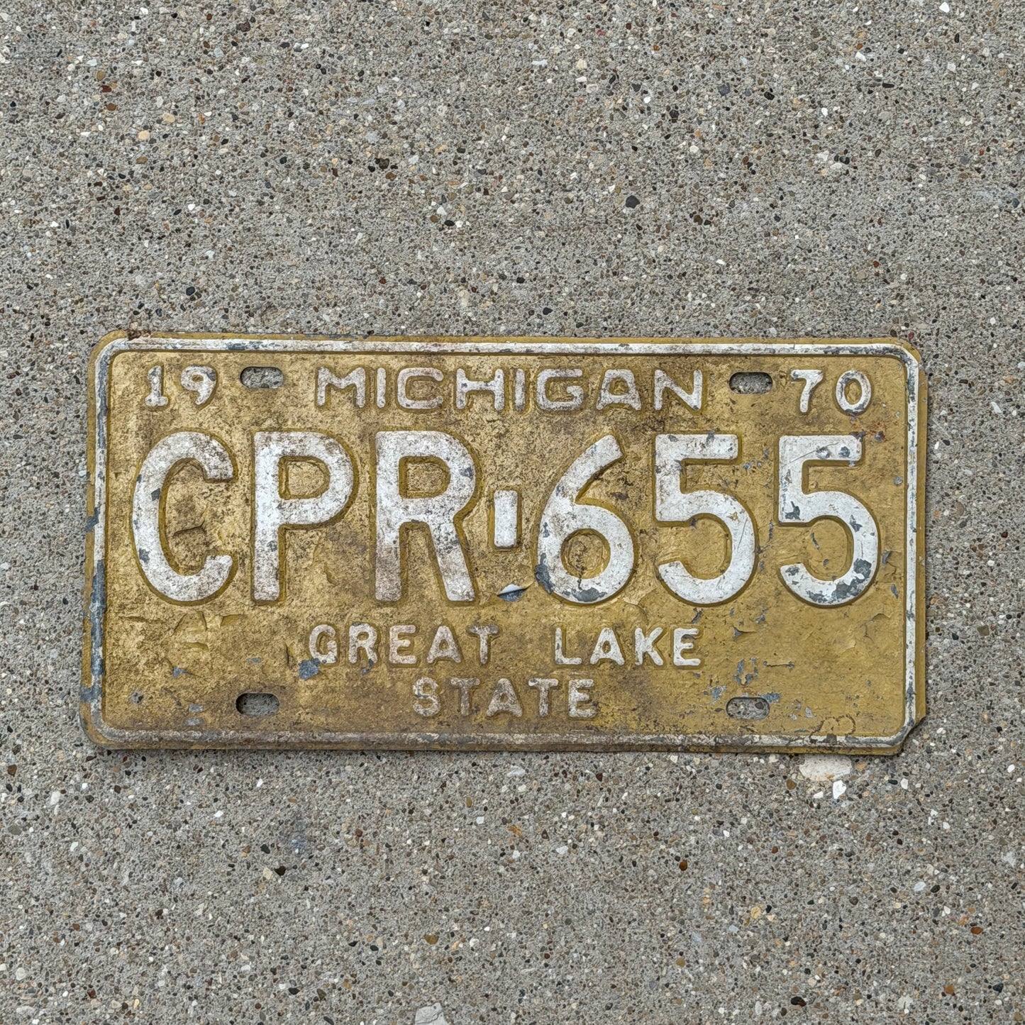 Photo of a 1970 Michigan License Plate Auto Tag Garage Decor Vintage CPR 655 with original patina
