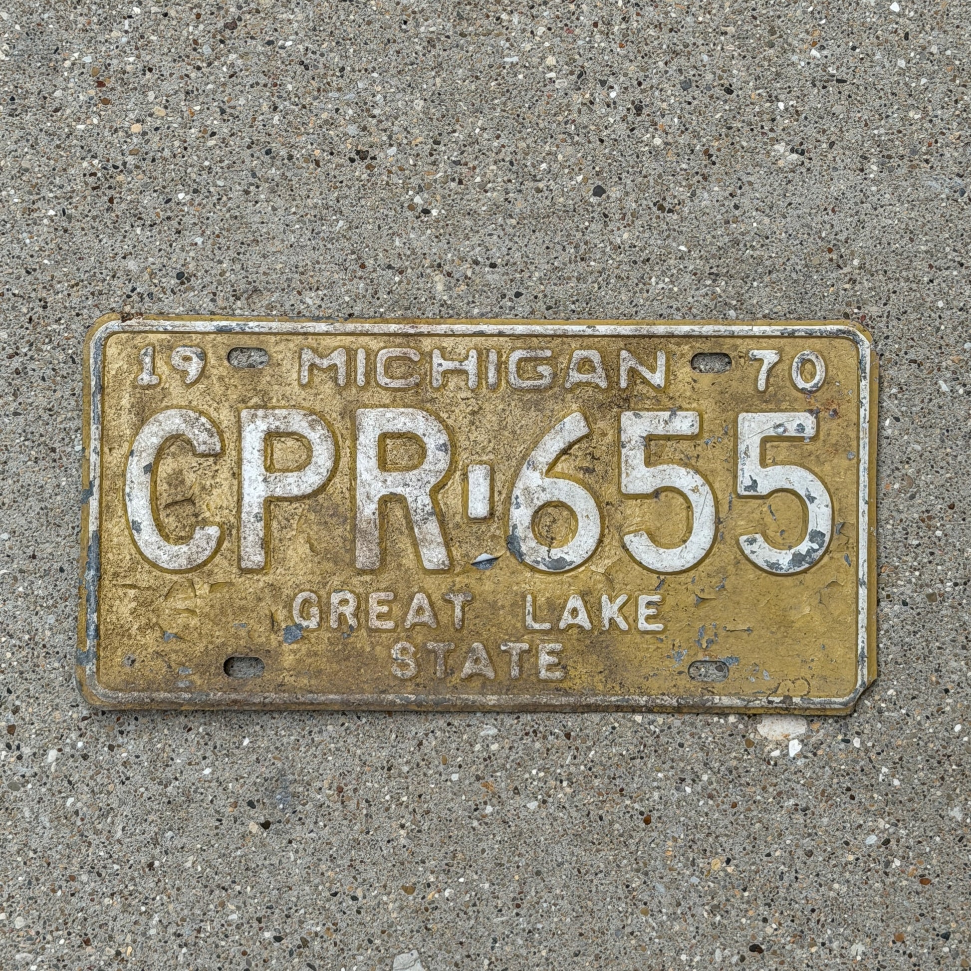 Photo of a 1970 Michigan License Plate Auto Tag Garage Decor Vintage CPR 655 with original patina
