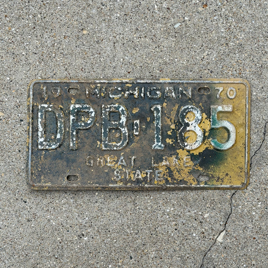 Photo of a 1970 Michigan License Plate Auto Tag Garage Decor Vintage DPB 185 with original patina