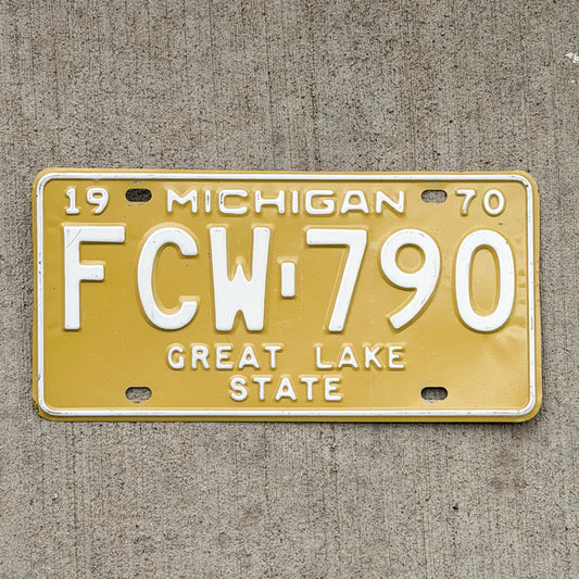 Photo of a 1970 Michigan License Plate Auto Tag Garage Decor Vintage FCW 790 with original patina