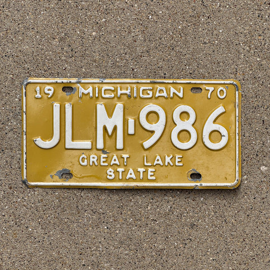 Photo of a 1970 Michigan License Plate Auto Tag Garage Decor Vintage JLM 986 with original patina