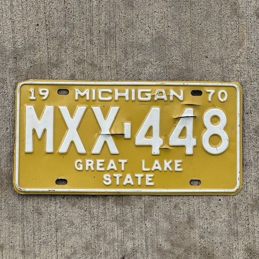 Photo of a 1970 Michigan License Plate Auto Tag Garage Decor Vintage MXX 448 with original patina