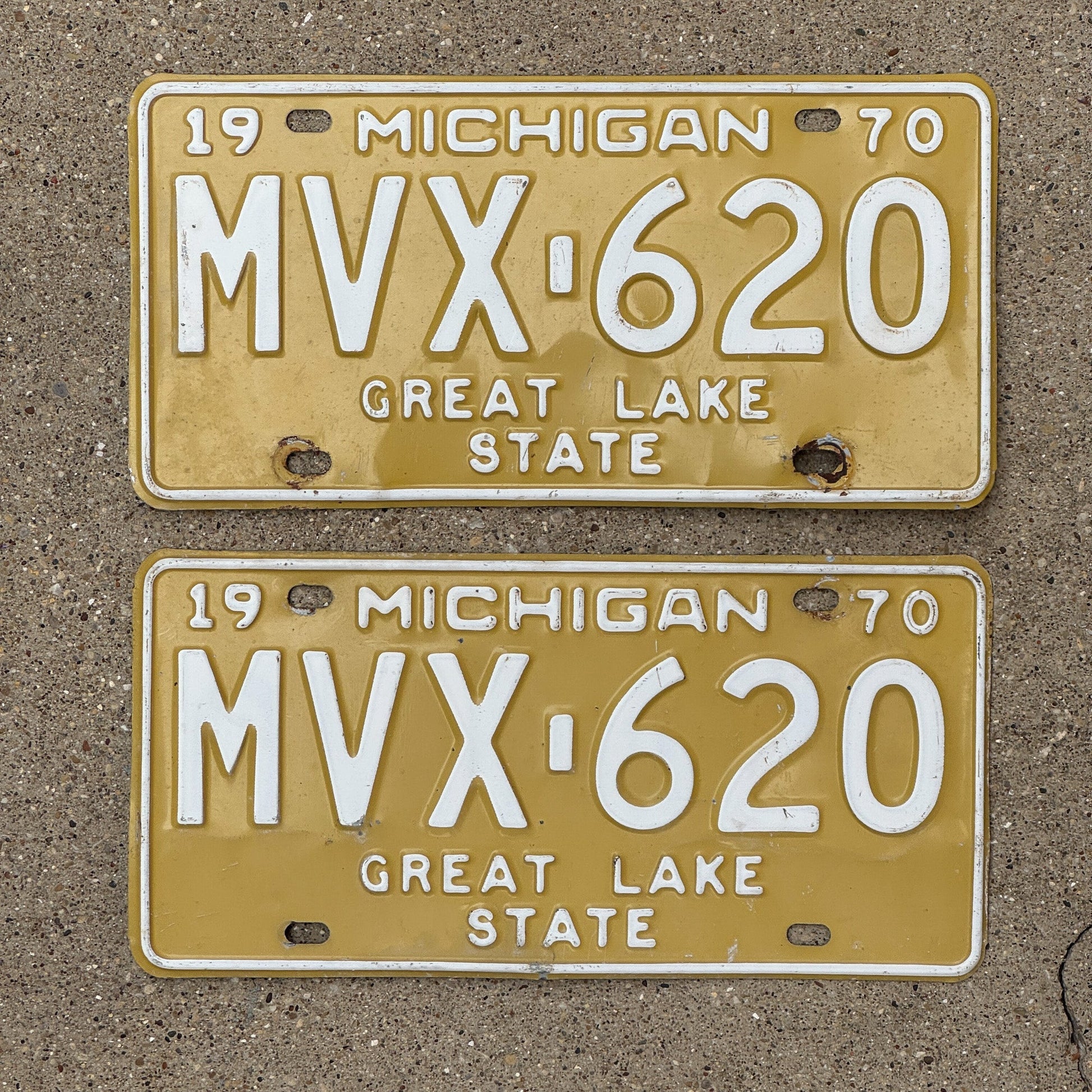Photo of a 1970 Michigan License Plate Pair Auto Tag Garage Decor Vintage MVX 620