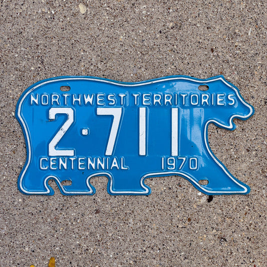 Photo of a 1970 Northwest Territories License Plate Auto Tag Garage Decor Vintage Low Number Four Digit Bear 2 711
