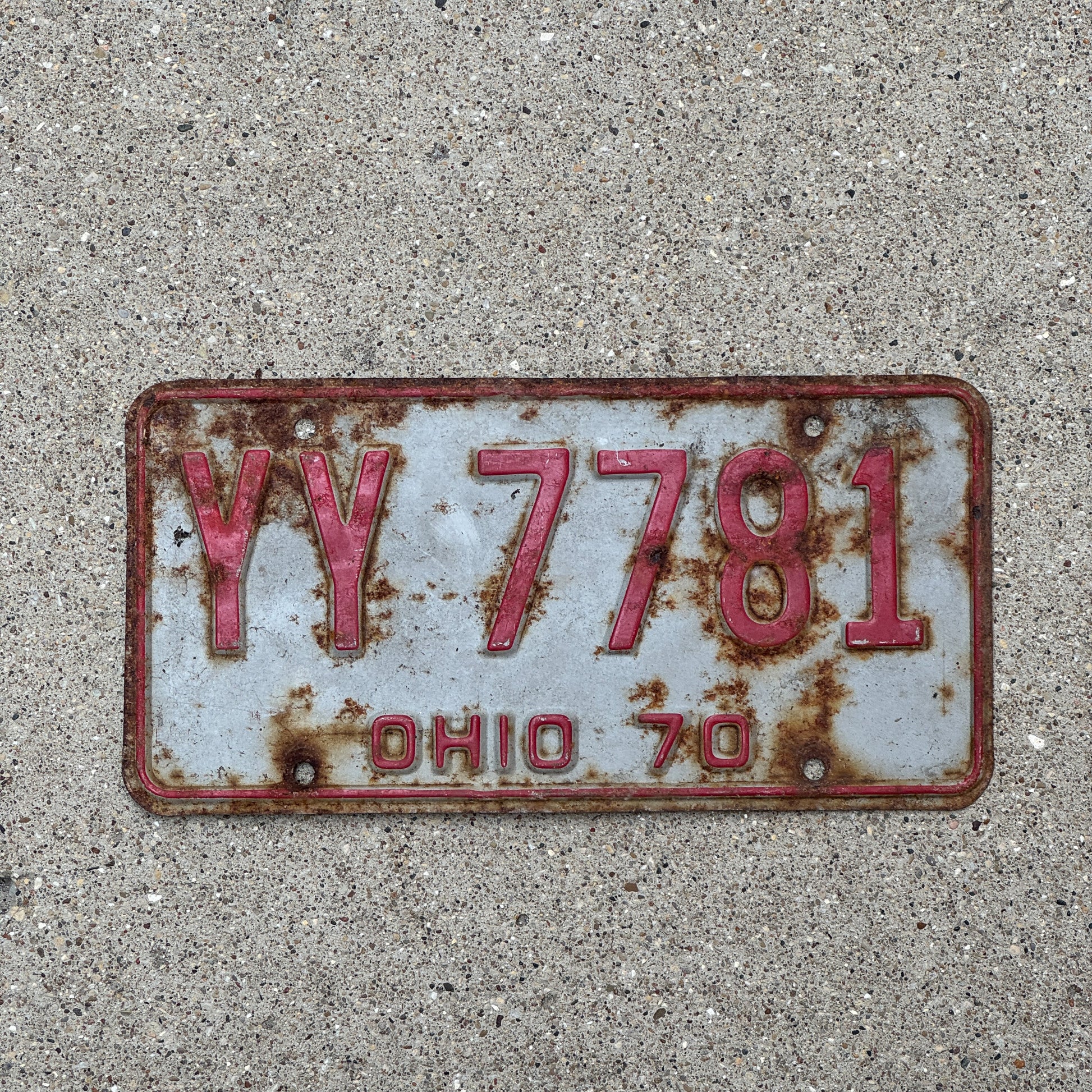 Photo of a 1970 Ohio License Plate Auto Tag Garage Decor Vintage YY 7781 with original patina