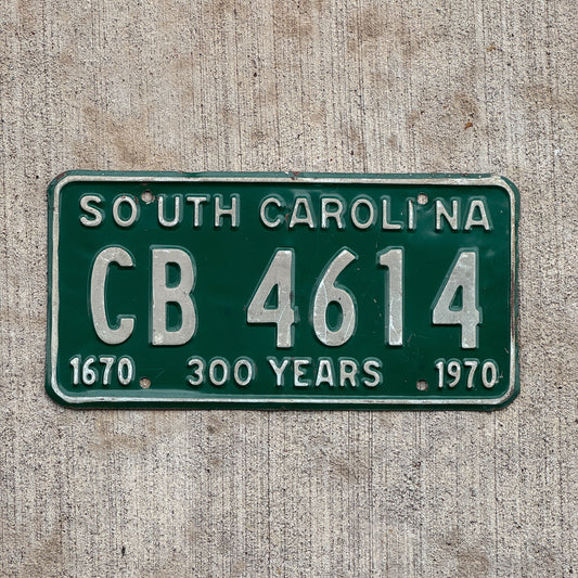 Photo of a 1970 South Carolina License Plate Auto Tag Garage Decor Vintage Tercenteary CB 4614 with original patina