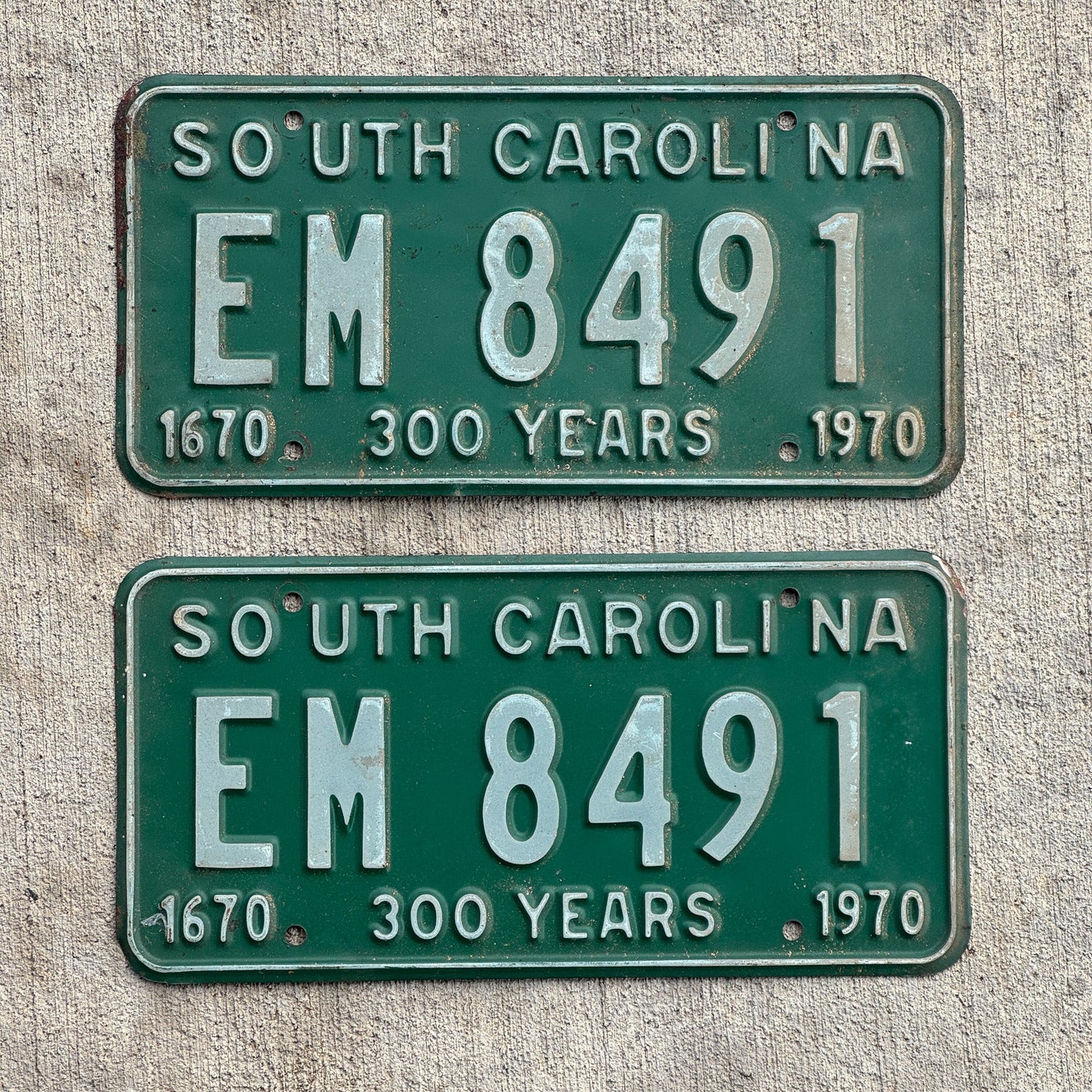 Photo of a 1970 South Carolina License Plate Pair Auto Tag Garage Decor Vintage EM 8491 with original patina