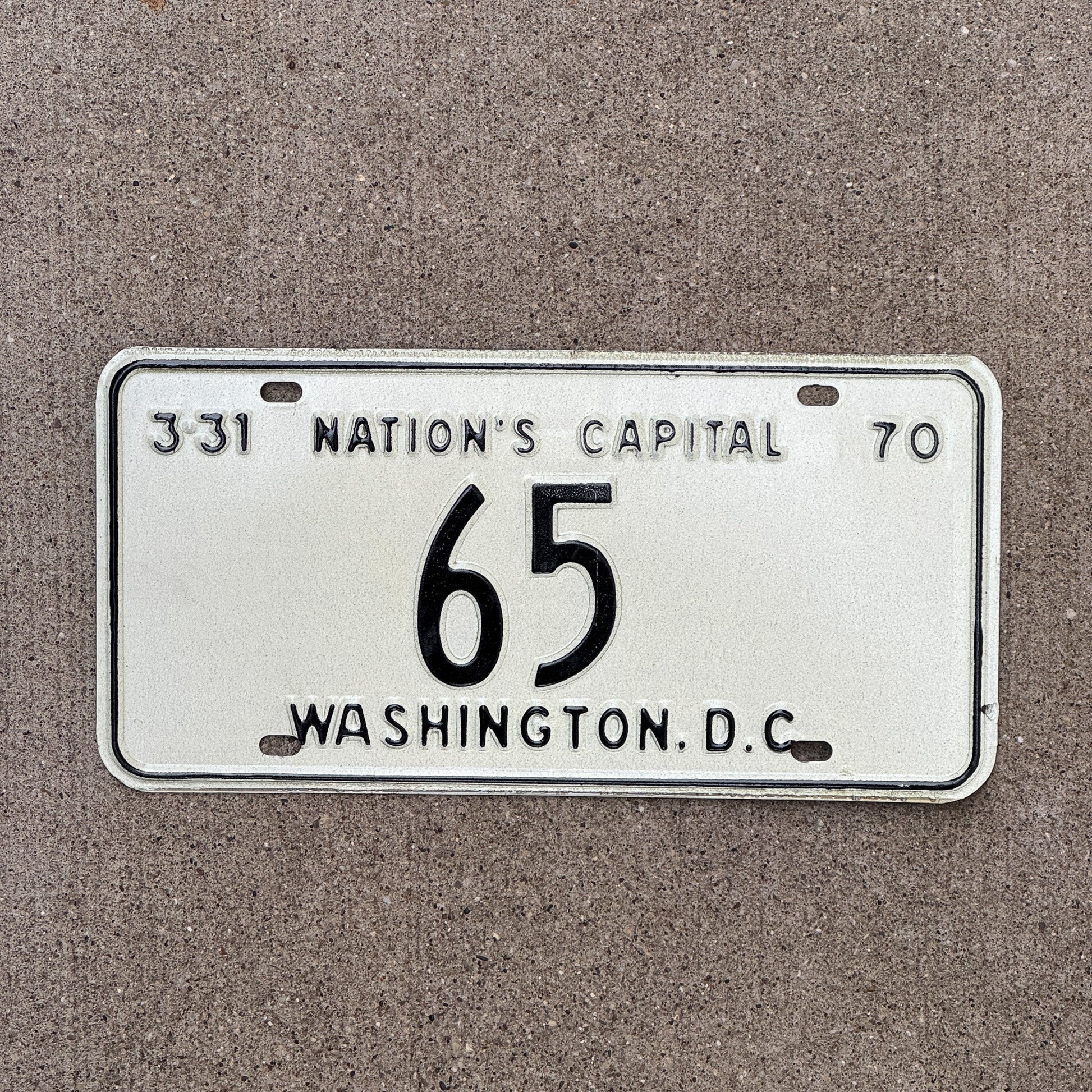 Photo of a 1970 Washington DC License Plate Auto Tag Garage Decor Vintage Low Number Two Digit 65 with original patina