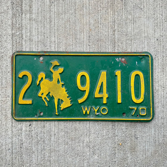 Photo of a 1970 Wyoming License Plate Auto Tag 2 Vintage Garage Cowboy Rodeo 2 9410 with original patina