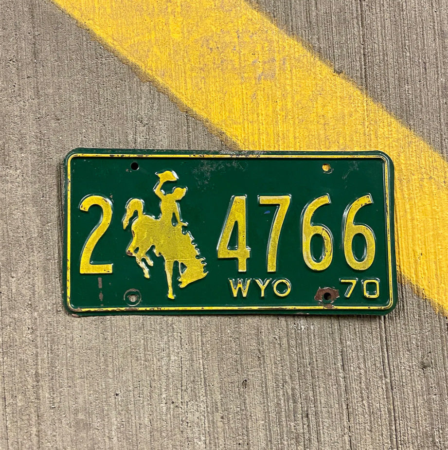 Photo of a 1970 Wyoming License Plate Auto Tag Garage Decor Vintage Cowboy Rodeo 2 4766 with original patina