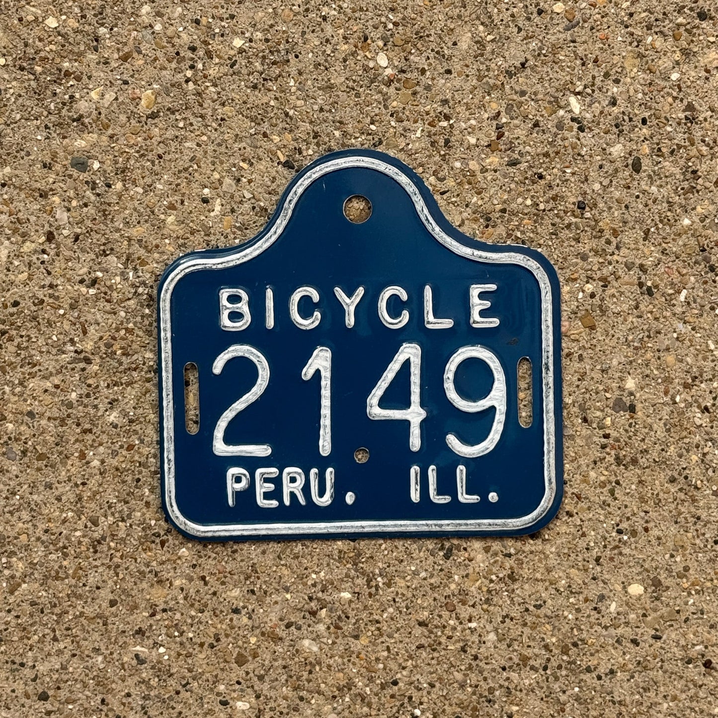 Photo of a 1970s Era Illinois Bicycle Auto Tag Garage Decor Vintage Peru 2149