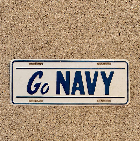 Photo of a 1970s Era License Plate Topper Auto Tag Garage Decor Vintage Booster Embossed Military Metal USA Vet GO NAVY