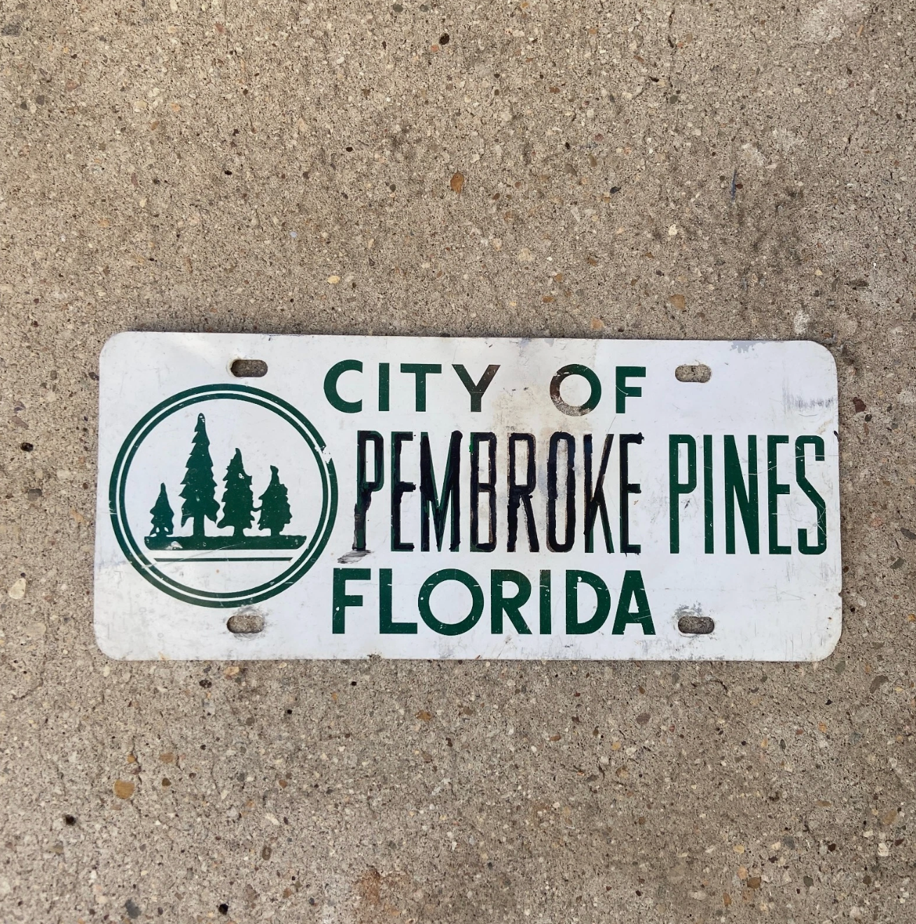 City of Pembroke Pines, Florida license plate on a concrete surface