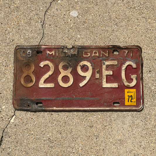 Photo of a 1971 1972 Michigan Commercial License Plate Auto Tag Garage Decor Vintage 8289 EG with original patina