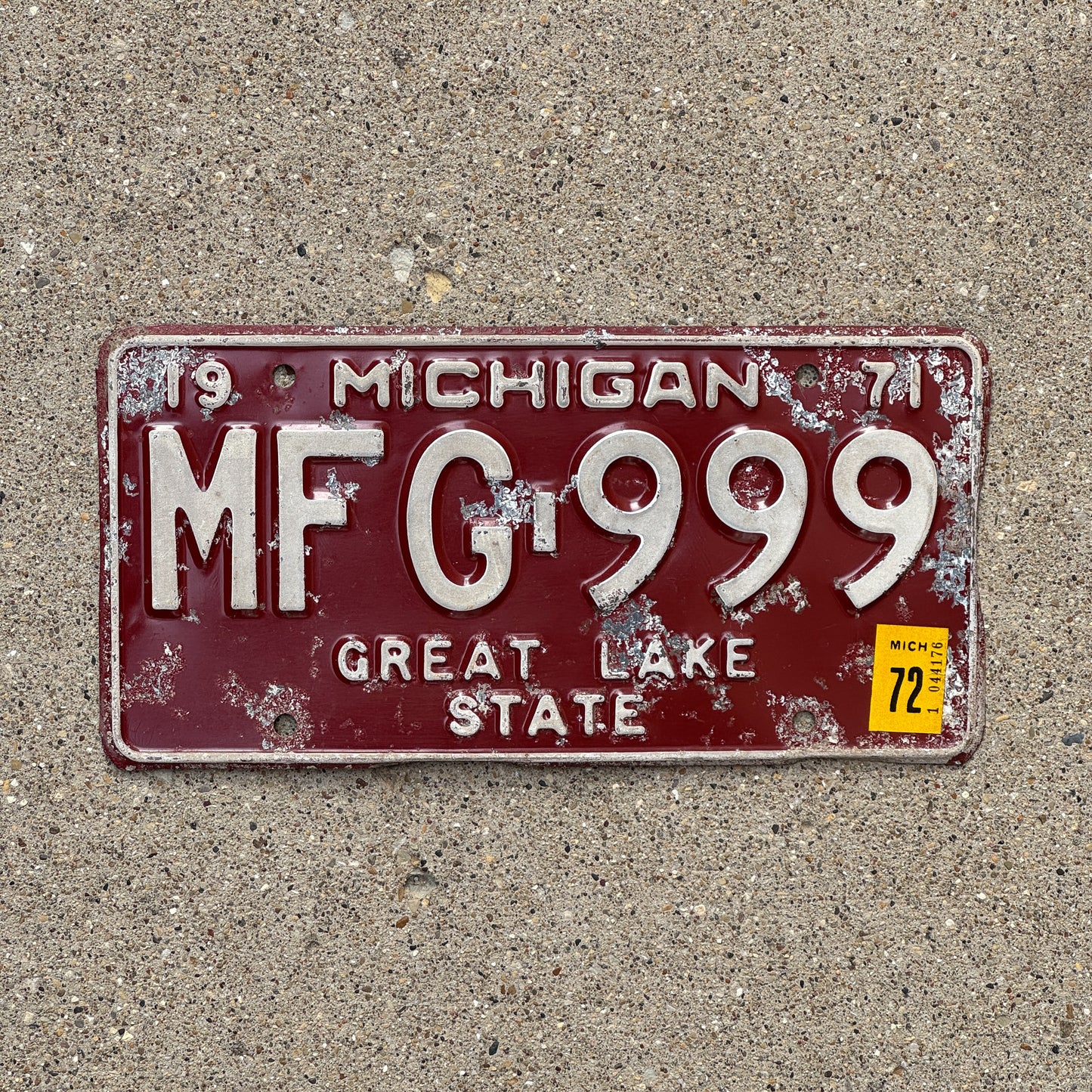 Photo of a 1971 1972 Michigan License Plate Auto Tag 2 Vintage Garage Repeat Repeating MFG 999 with original patina