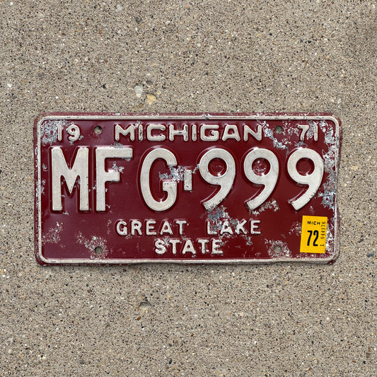 Photo of a 1971 1972 Michigan License Plate Auto Tag 2 Vintage Garage Repeat Repeating MFG 999 with original patina