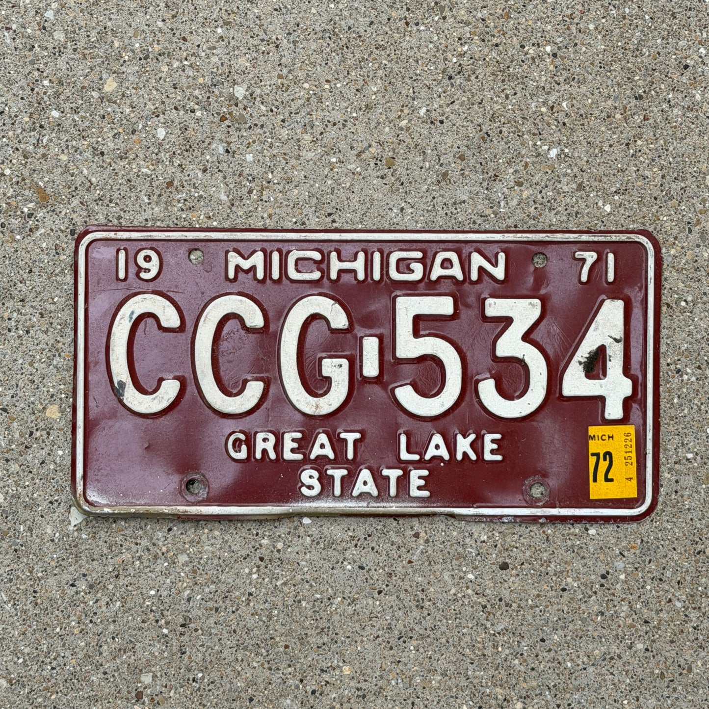 Photo of a 1971 1972 Michigan License Plate Auto Tag Garage Decor Vintage CCG 534 with original patina