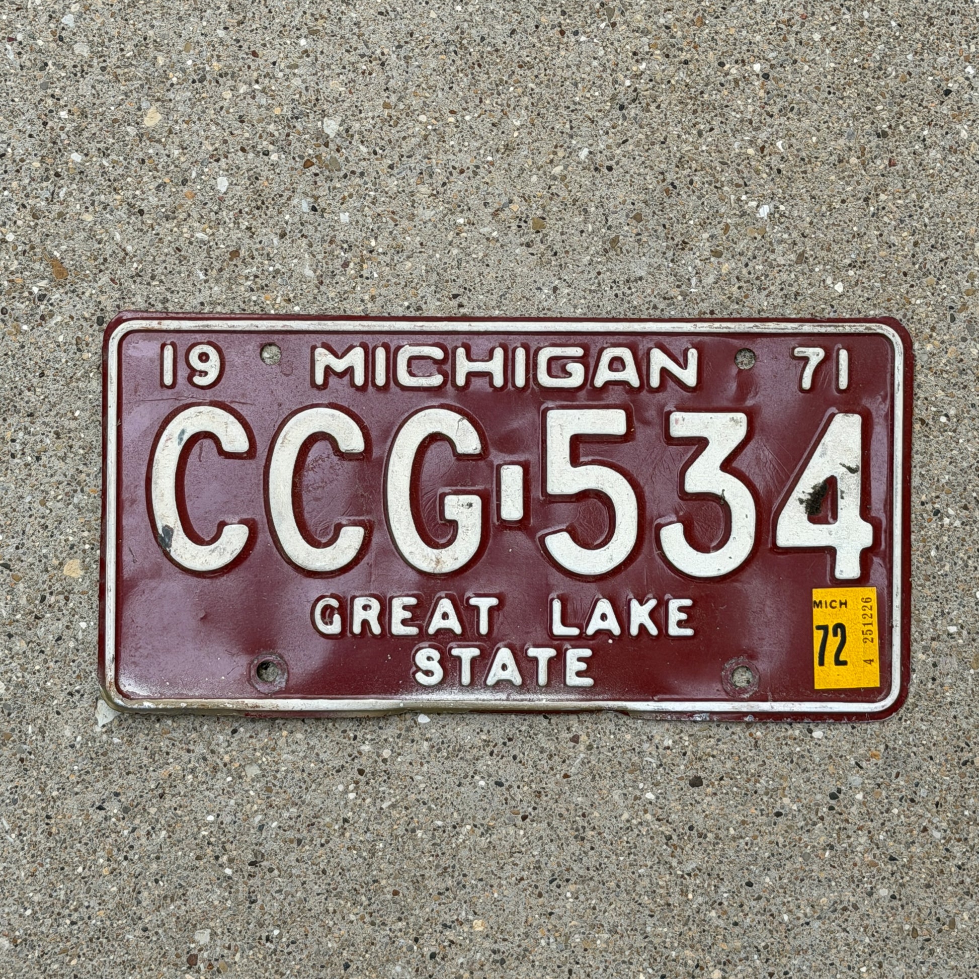 Photo of a 1971 1972 Michigan License Plate Auto Tag Garage Decor Vintage CCG 534 with original patina