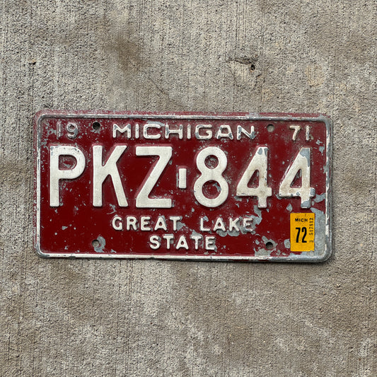 Photo of a 1971 1972 Michigan License Plate Auto Tag Garage Decor Vintage PKZ 844 with original patina