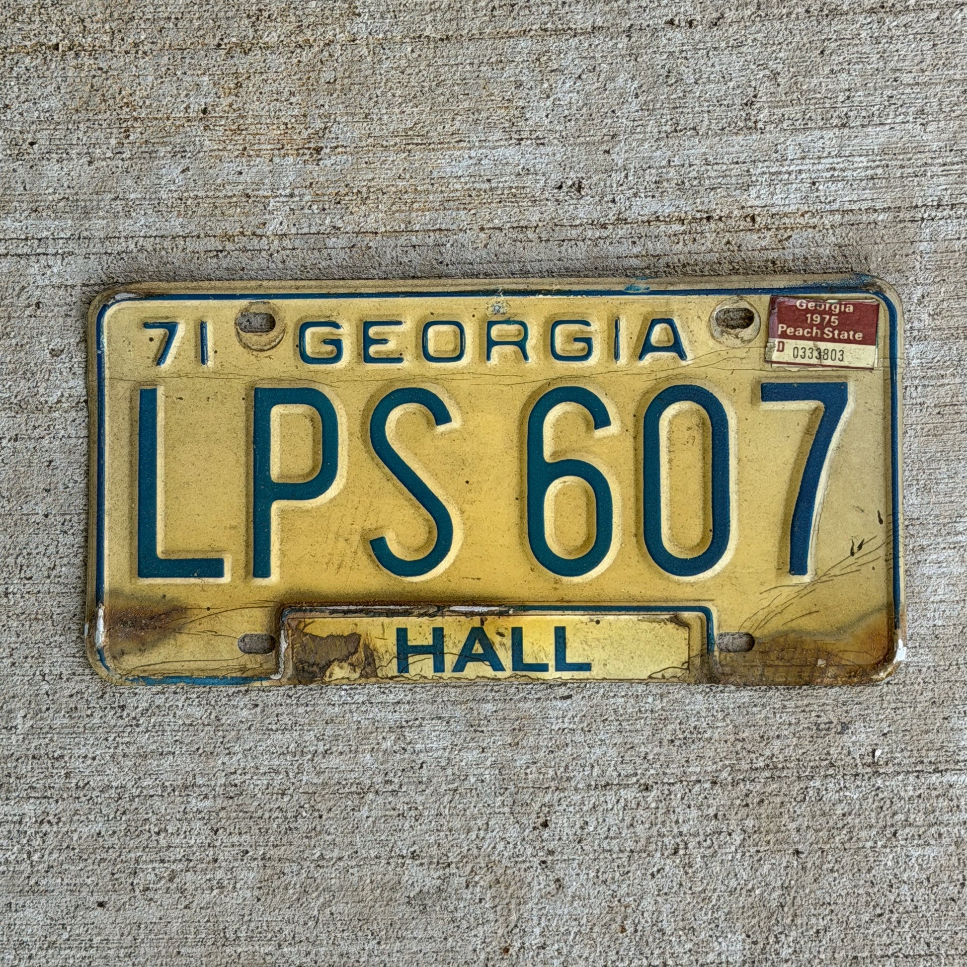 Photo of a 1971 1975 Georgia License Plate Auto Tag Garage Decor Vintage LPS 607 with original patina