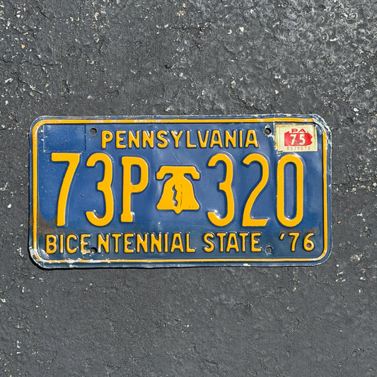 Photo of a 1971 1975 Pennsylvania License Plate Auto Tag Garage Decor Vintage Bicentennial Liberty Bell 73P 320 with original patina