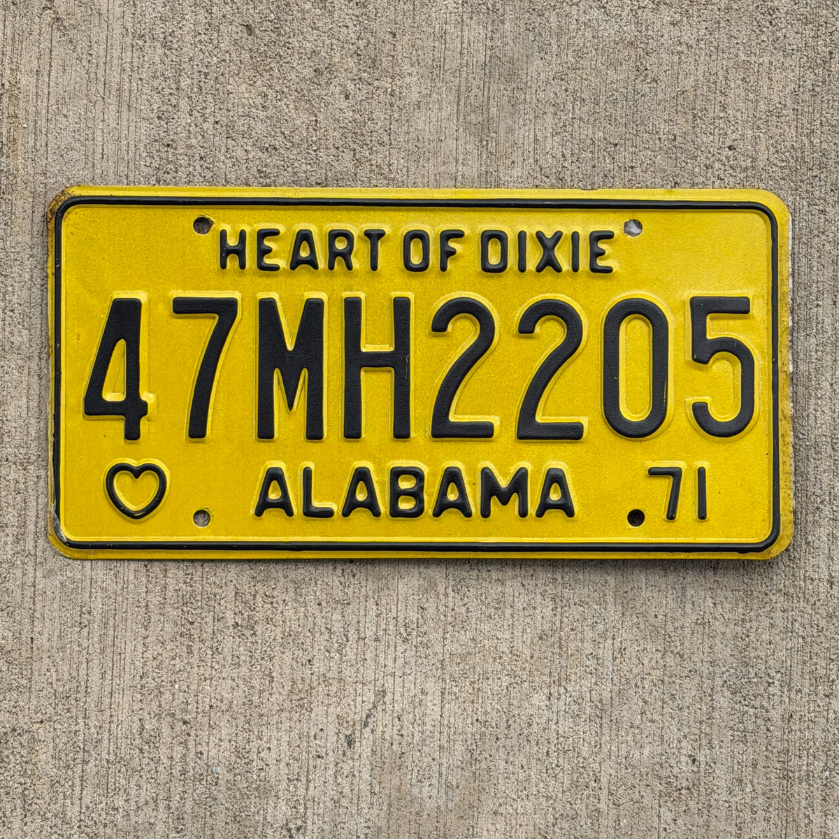Photo of a 1971 Alabama Mobile Home License Plate Auto Tag Garage Decor Vintage 47 MH 2205 with original patina