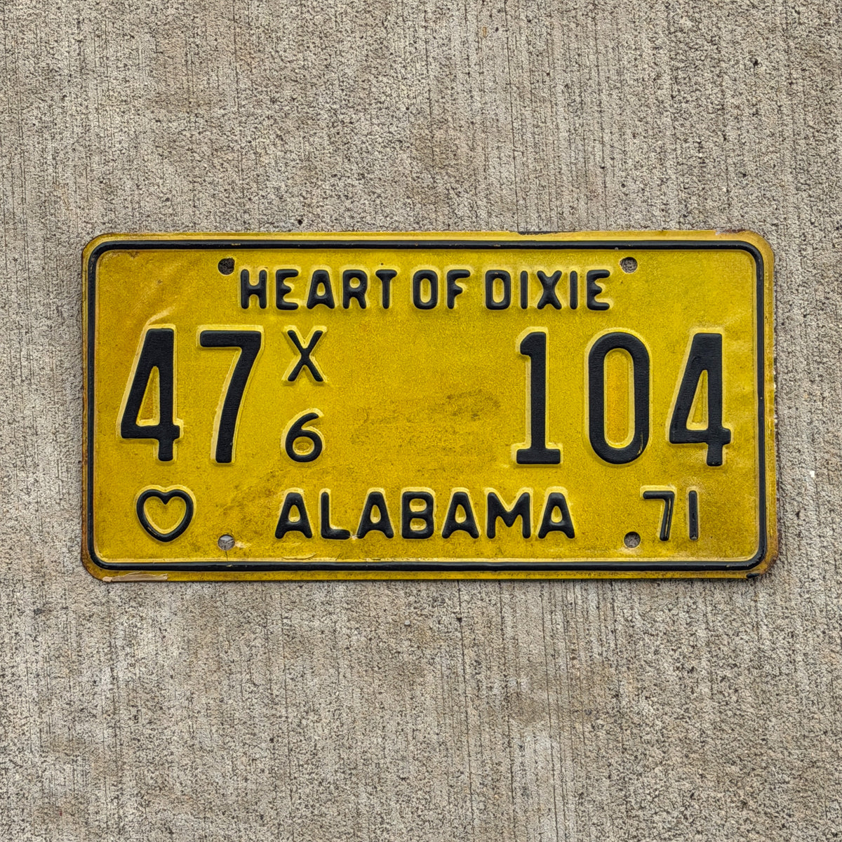 Photo of a 1971 Alabama Truck License Plate Auto Tag Garage Decor Vintage For Hire 47 X6 104 with original patina