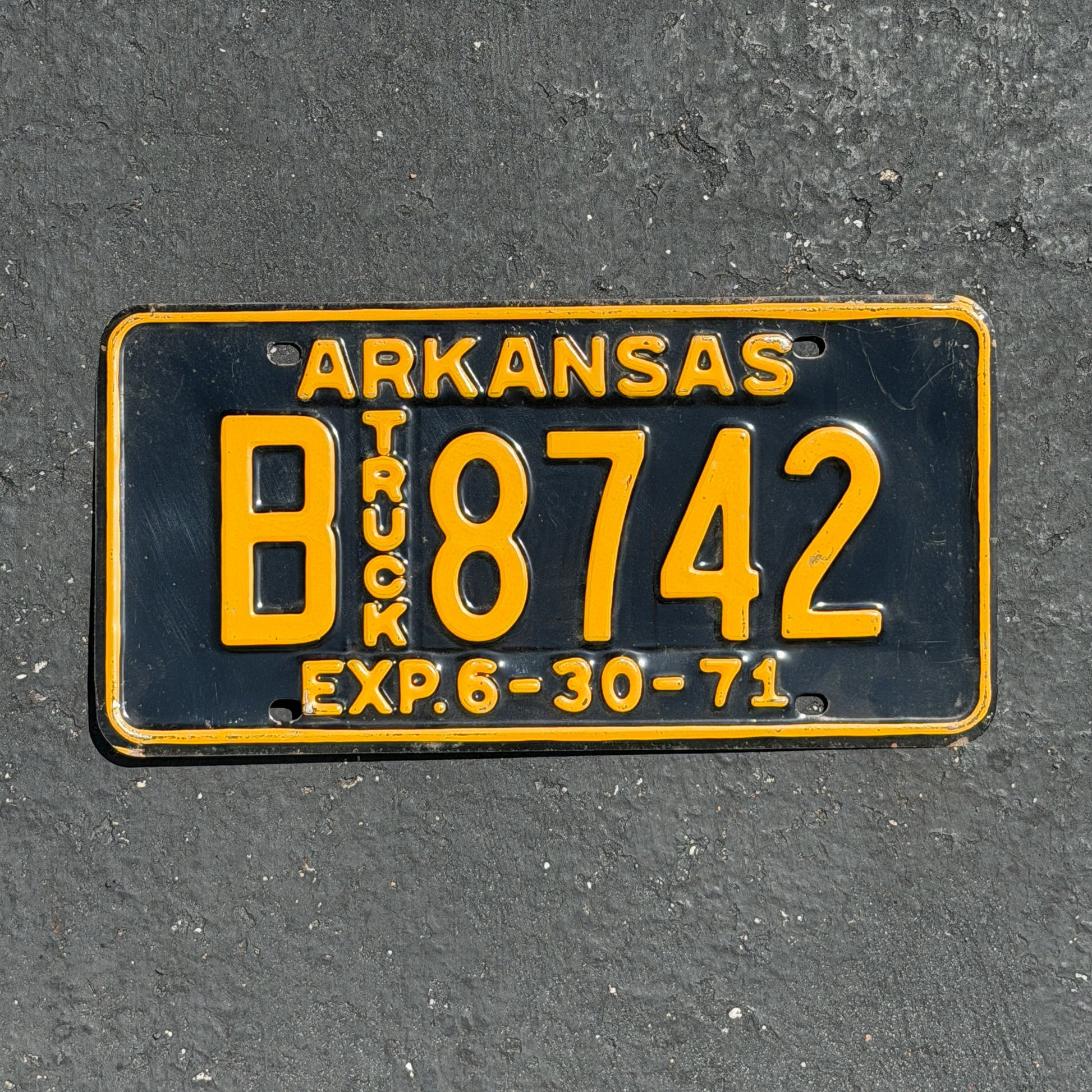 Photo of a 1971 Arkansas Truck License Plate Auto Tag Garage Decor Vintage B 8742 with original patina