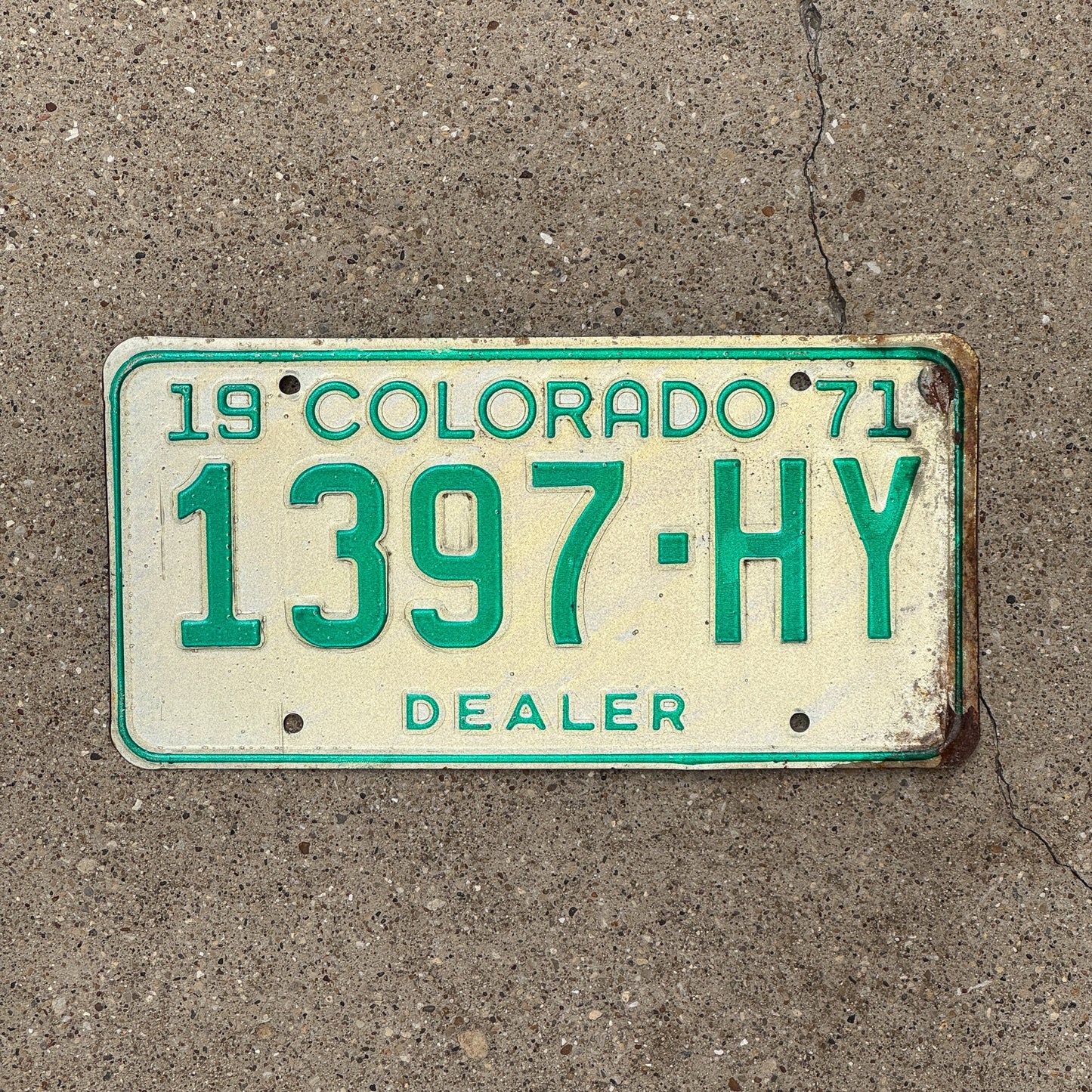 Photo of a 1971 Colorado Dealer License Plate Auto Tag Garage Decor Vintage 1397 HY