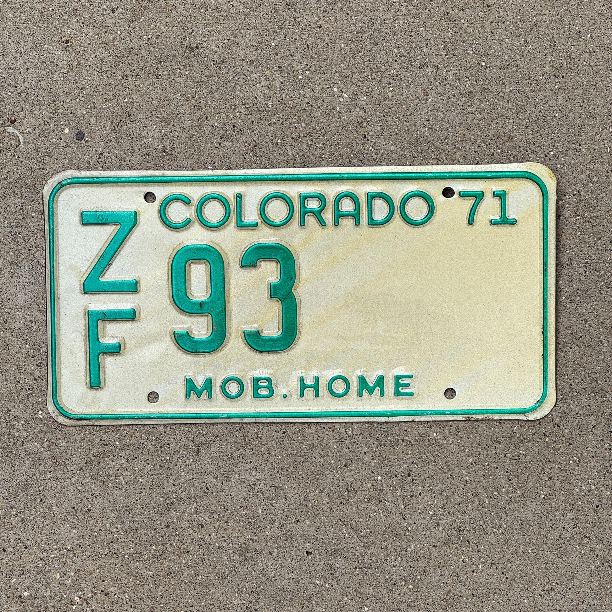 Photo of a 1971 Colorado Mobile Home License Plate Auto Tag Garage Decor Vintage ZF 93